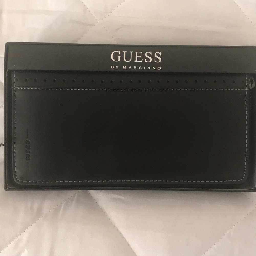 Women’s Guess by Marciano leather wallets